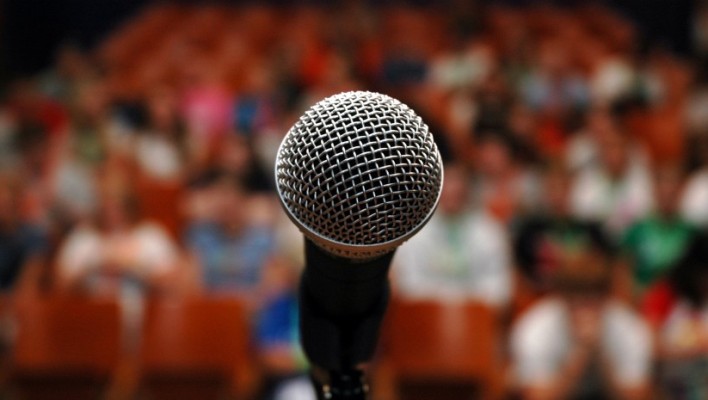 microphone-and-crowd-e12639204361031