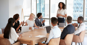 Woman leading discussion in conference room