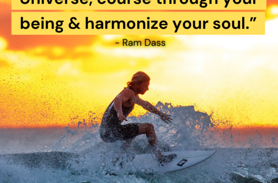 Woman surfing a wave at sunrise