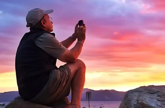 Dewitt Jones photographer taking a photo of a beautiful sunset